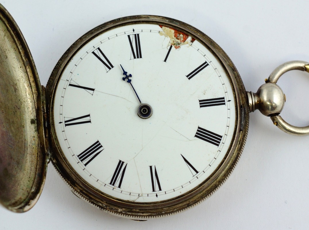 Appraisal: Unmarked silver pocket watch containing a rare key wind and