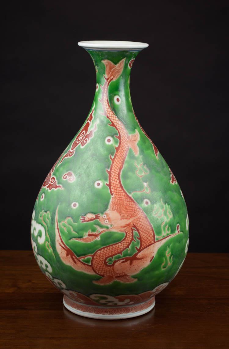 Appraisal: CHINESE MING STYLE PORCELAIN DRAGON VASE having a solid green