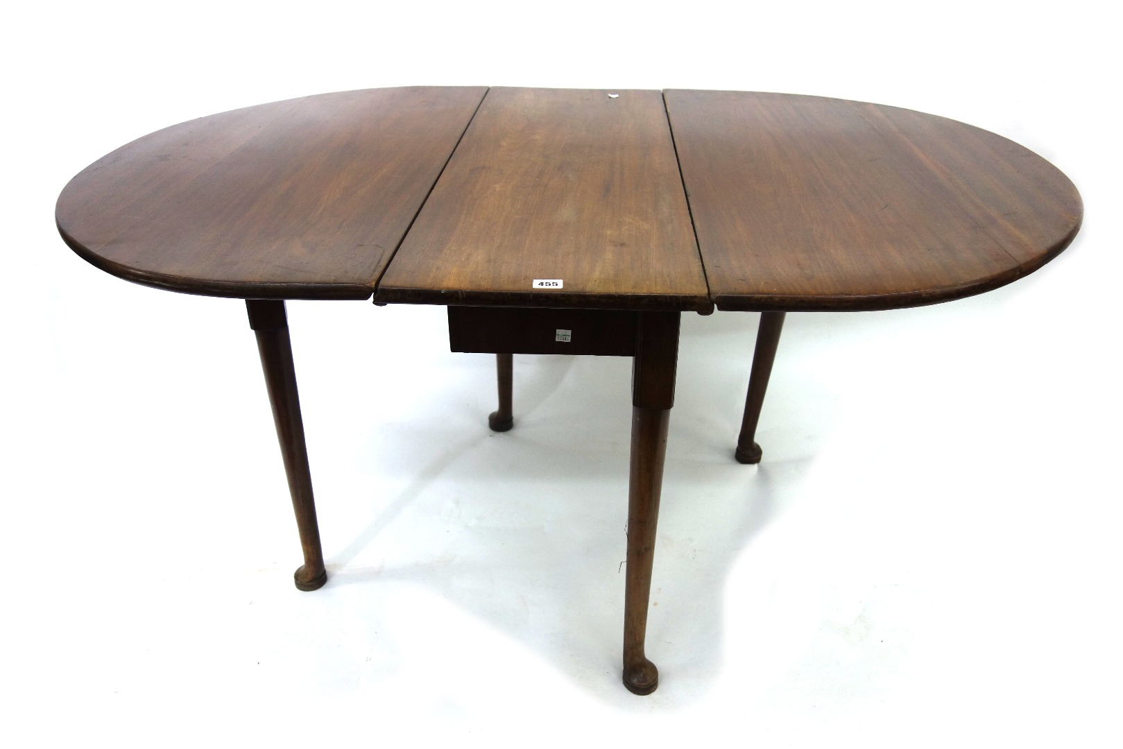 Appraisal: A mid th century mahogany drop leaf dining table the