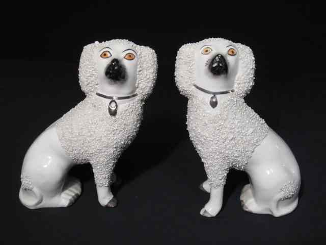 Appraisal: Pair of Staffordshire porcelain Spaniel figurines Hand painted with applied