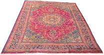 Appraisal: A Tabriz Rug A Tabriz rug with predominantly rose color