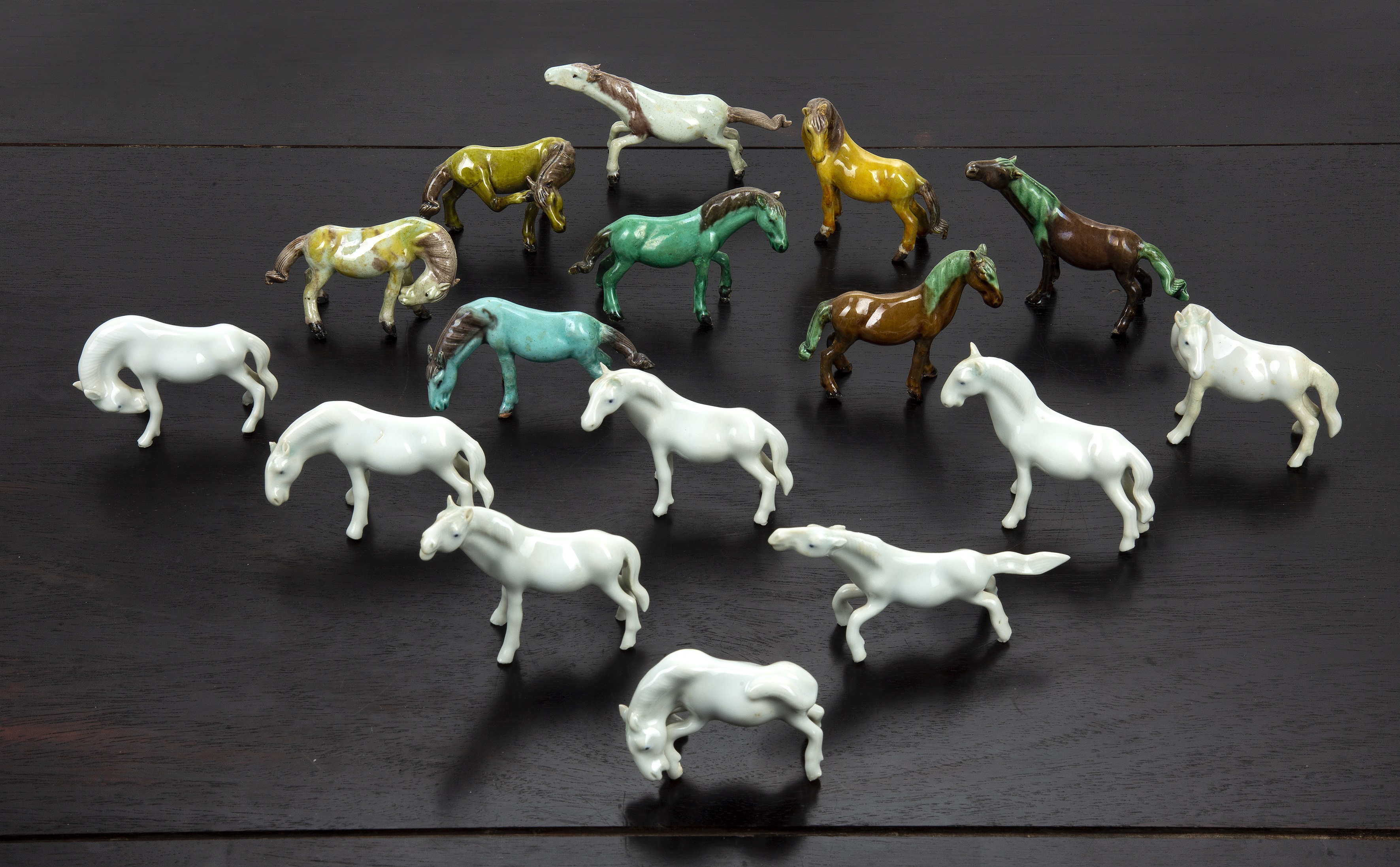 Appraisal: Sixteen miniature porcelain model horsesChinese including blanc de chine and