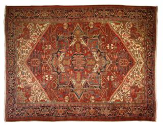 Appraisal: A PERSIAN HERIZ TRIBAL RUG th century The scarlet field