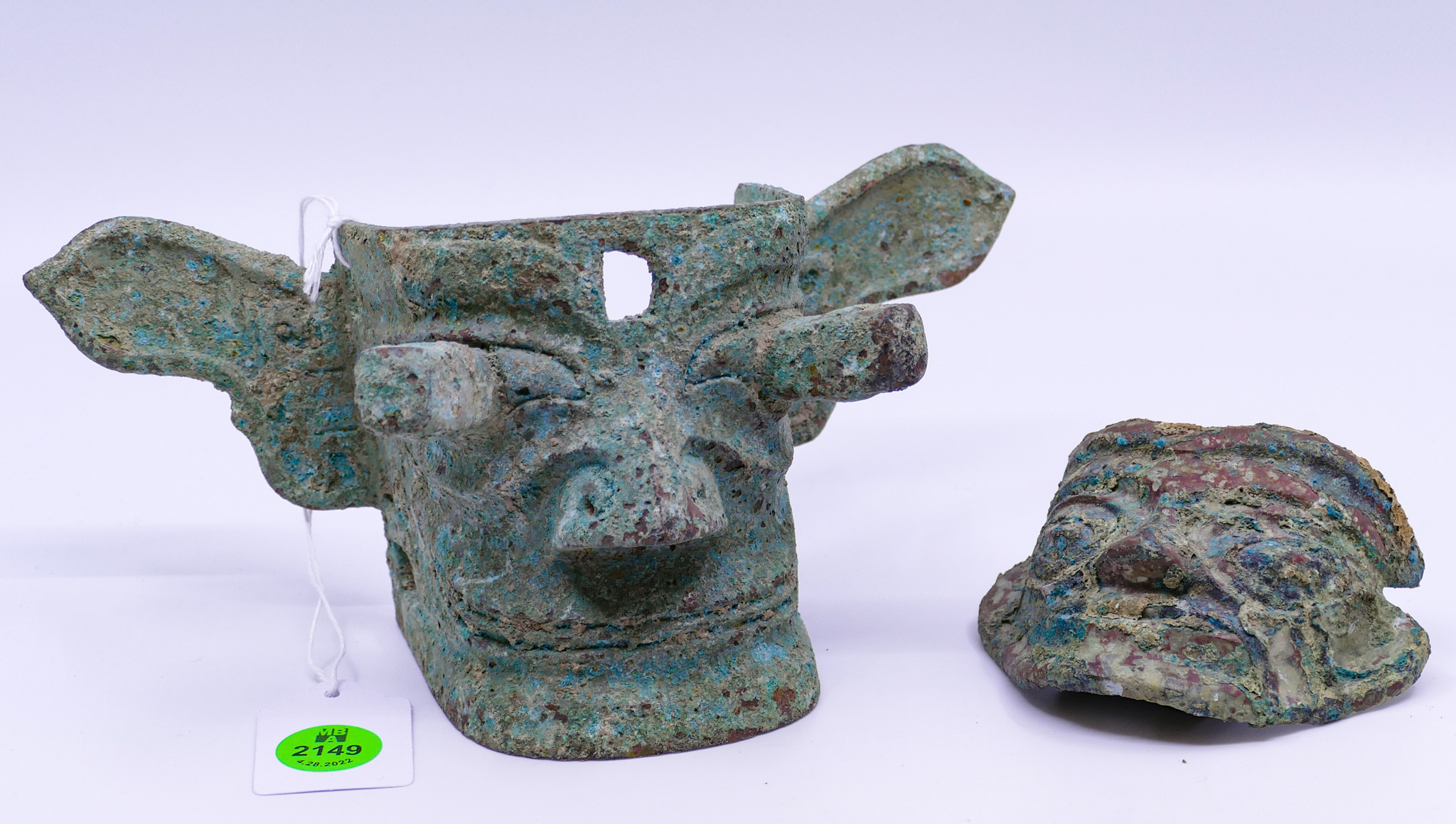 Appraisal: pc Chinese Archaic Style Bronze Masks- '' and ''