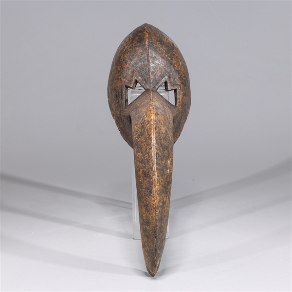 Appraisal: West African carved wood bird style mask with large beak