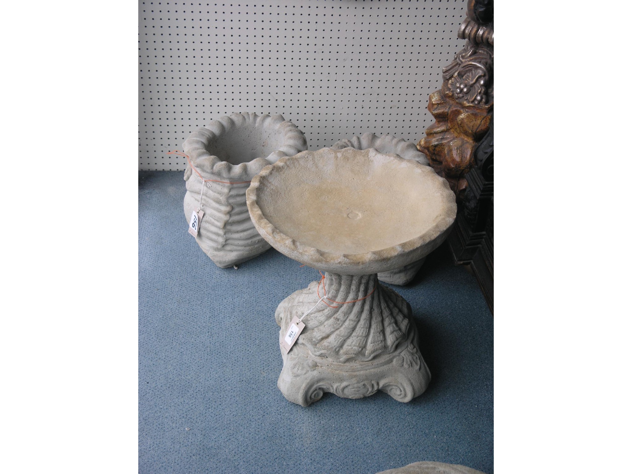 Appraisal: A moulded concrete bird bath circular and a pair of