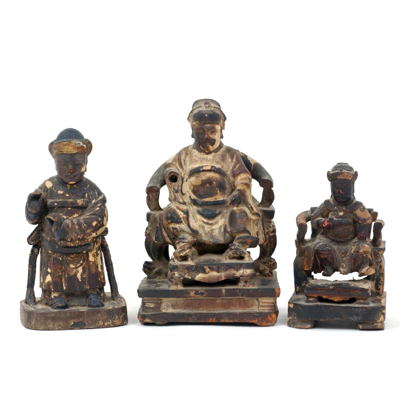 Appraisal: Group of Three Chinese Wooden Statues of Officials comprised of