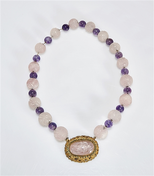 Appraisal: Chinese carved rose quartz and amethyst bead necklace centering a