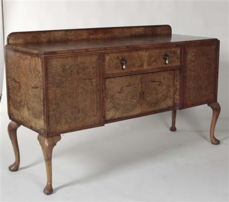 Appraisal: A Queen Anne style burr walnut inverted breakfront sideboard the