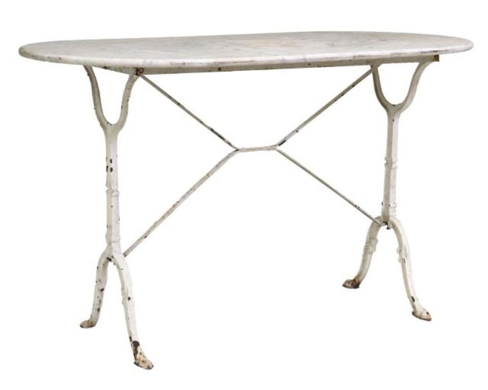 Appraisal: French cast iron bistro table th c oval marble top