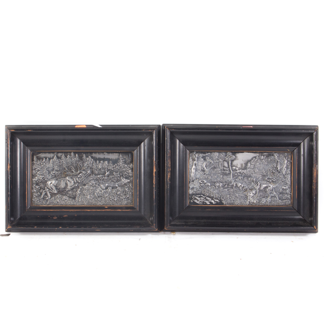 Appraisal: Pair of framed metal hunt scenes