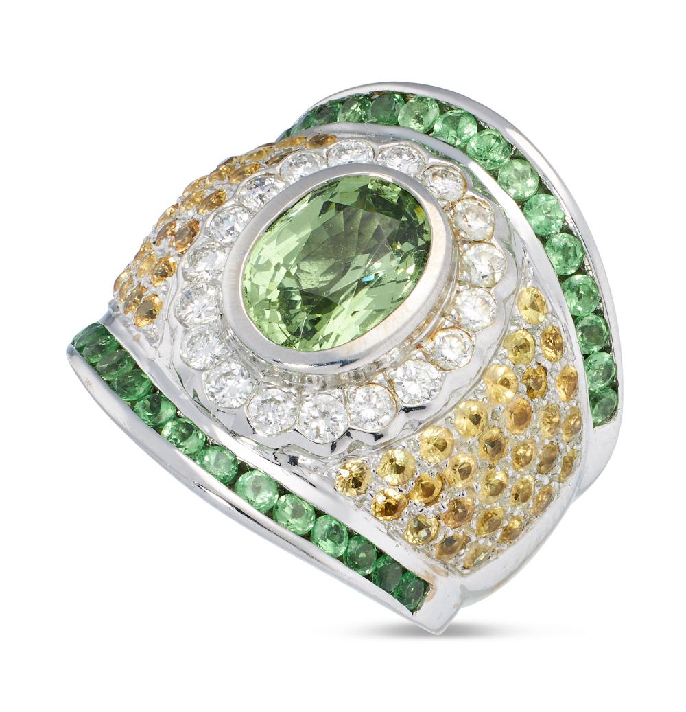 Appraisal: DIAMOND YELLOW SAPPHIRE TSAVORITE GARNET SYNTHETIC GREEN SPINEL AND KT