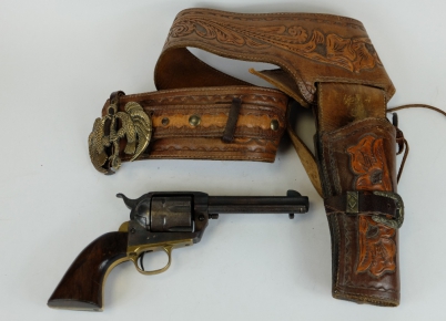 Appraisal: Replica hand gun in brown leather belt and holster