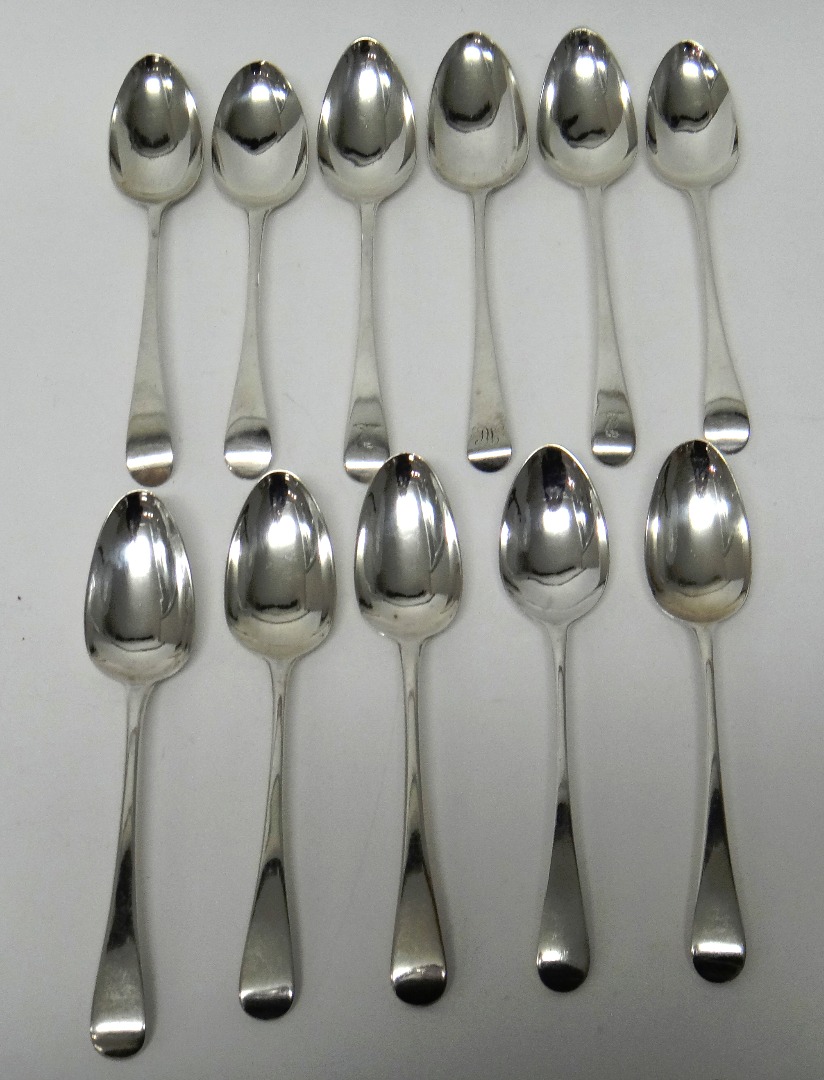 Appraisal: Eleven silver Old English pattern tablespoons comprising three London three