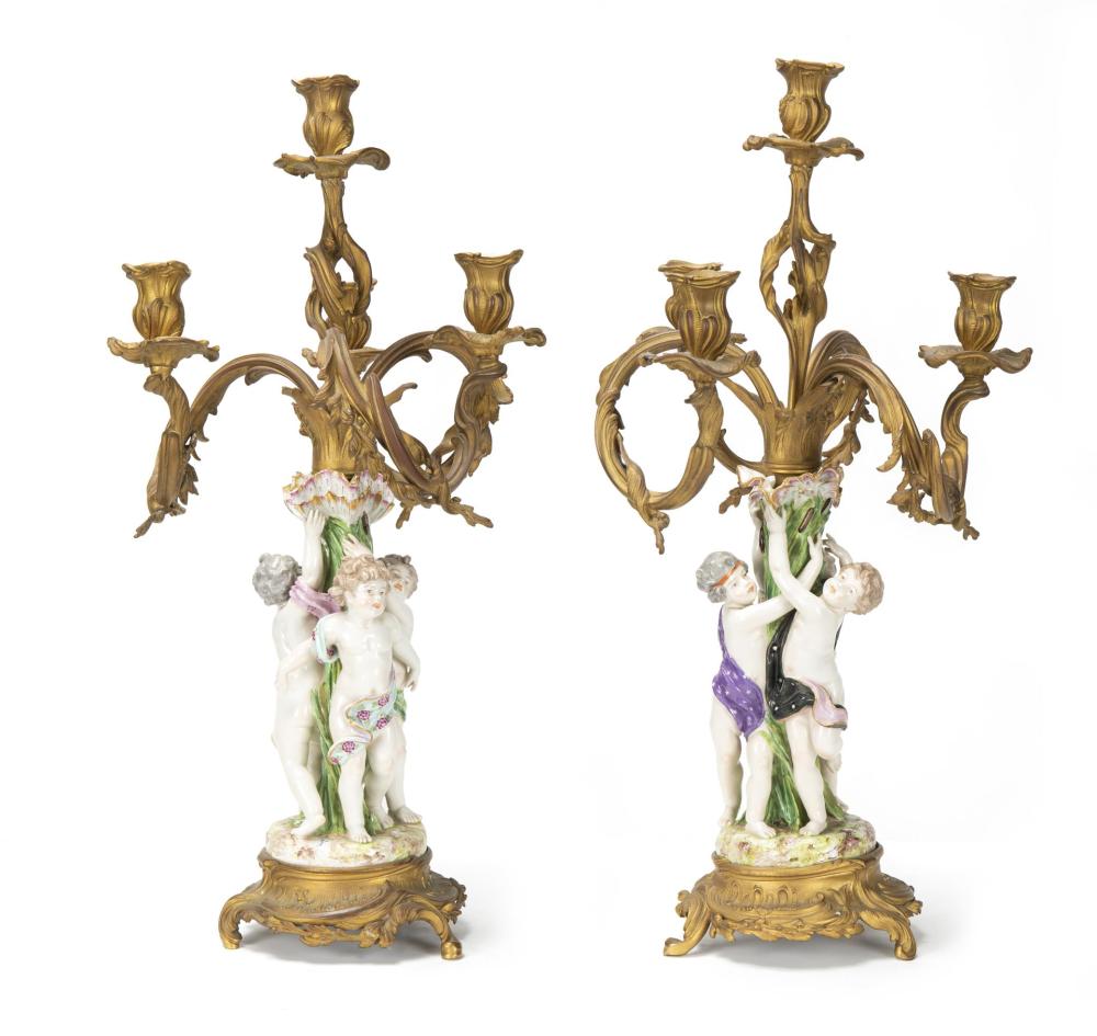 Appraisal: A pair of German gilt-bronze candelabras Late th early th