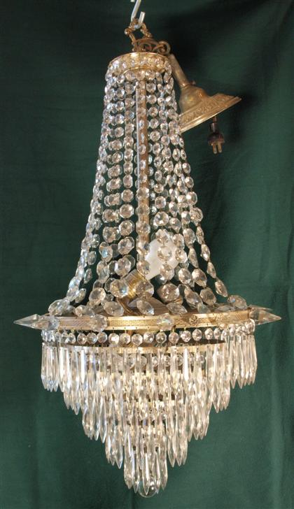 Appraisal: Empire style gilt metal and glass chandelier th century