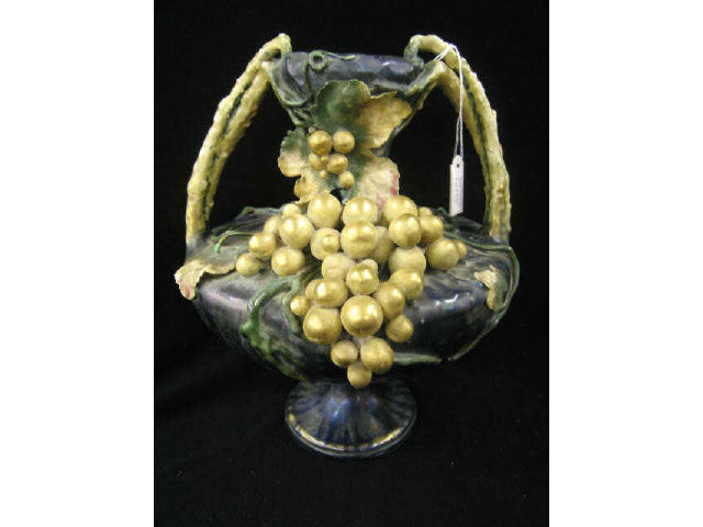 Appraisal: Amphora Art Pottery Vase Turn-Teplitz Austria raised grape vine decor