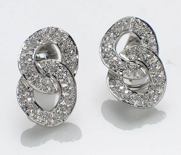 Appraisal: A pair of diamond clip-earrings Meister estimated total diamond weight