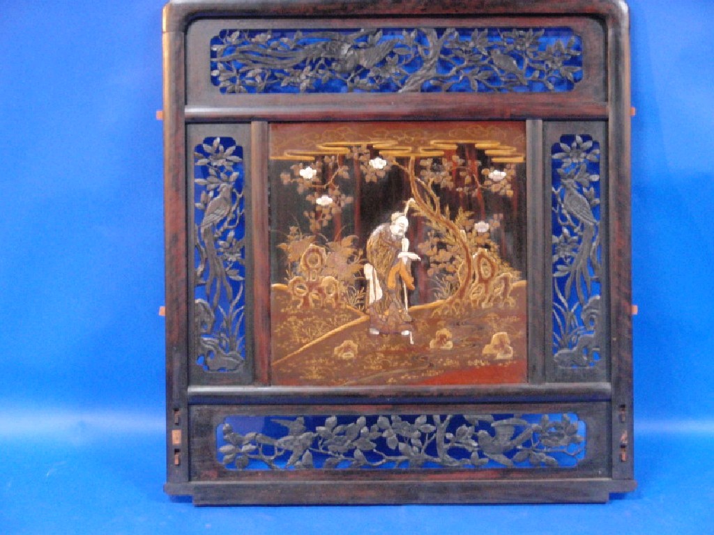 Appraisal: A Japanese carved rosewood double sided shibayama panel with open