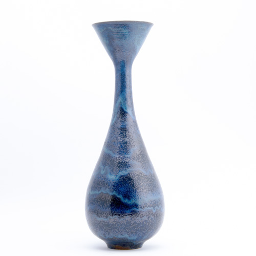 Appraisal: NATZLER Exceptional tall bulbous vase covered in a spectacular blue