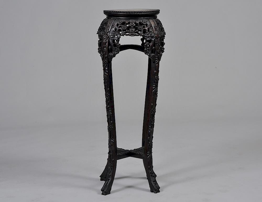 Appraisal: CARVED HARDWOOD PEDESTAL Chinese With circular marble inset top above