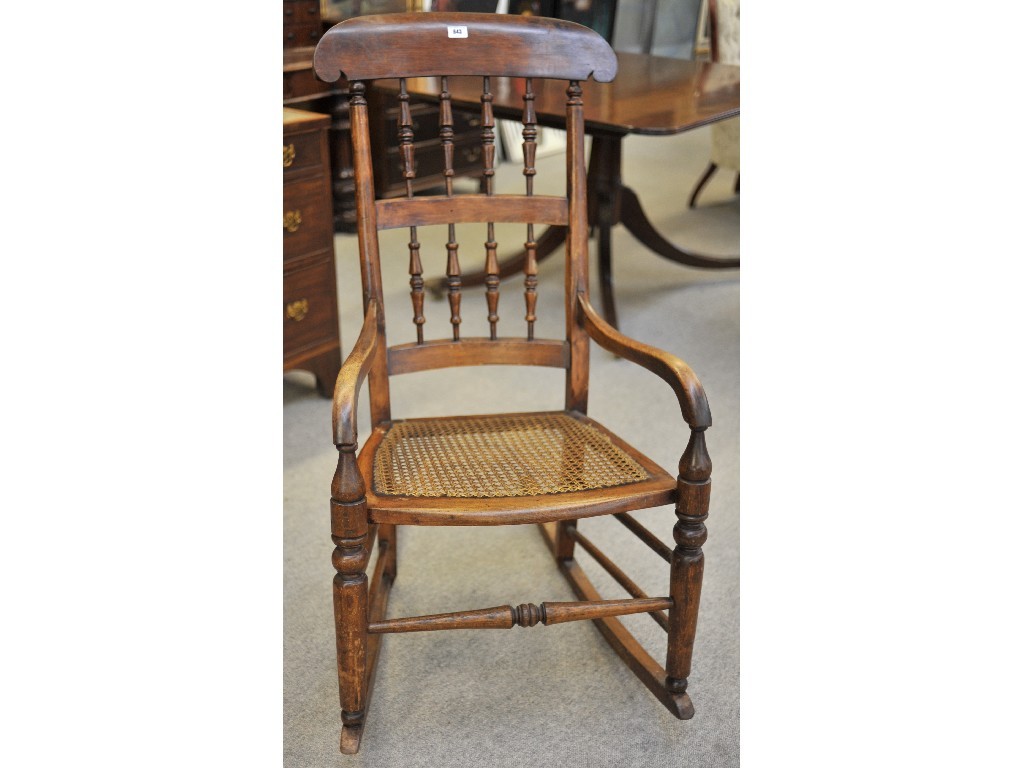 Appraisal: Rocking chair with cane seat