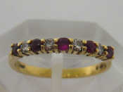 Appraisal: An carat yellow gold diamond and ruby nine stone ring