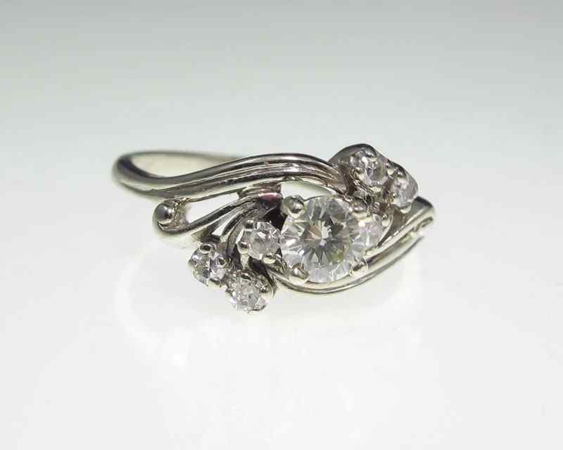 Appraisal: RETRO DIAMOND RING A sweet K white gold ring centering