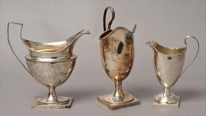 Appraisal: THREE FEDERAL SILVER HELMET-FORM CREAMERS Comprising one by L Holland