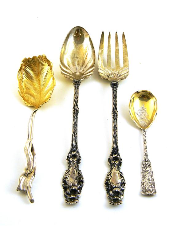 Appraisal: STERLING four pieces Whiting Lily pattern salad spoon and fork