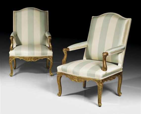 Appraisal: PAIR OF FAUTEUILS R gence Paris circa Richly carved beech