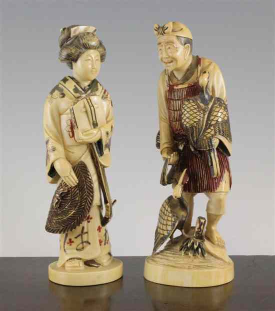 Appraisal: Two Japanese coloured ivory figures first half th century the