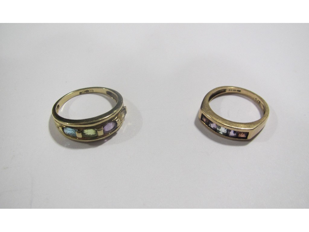 Appraisal: Two ct gold multi gem set half hoop rings