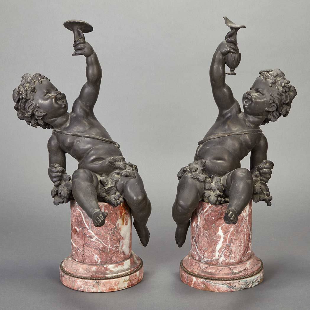 Appraisal: Pair of Louis XV Style Black Patinated-Metal Figures of Bacchantes