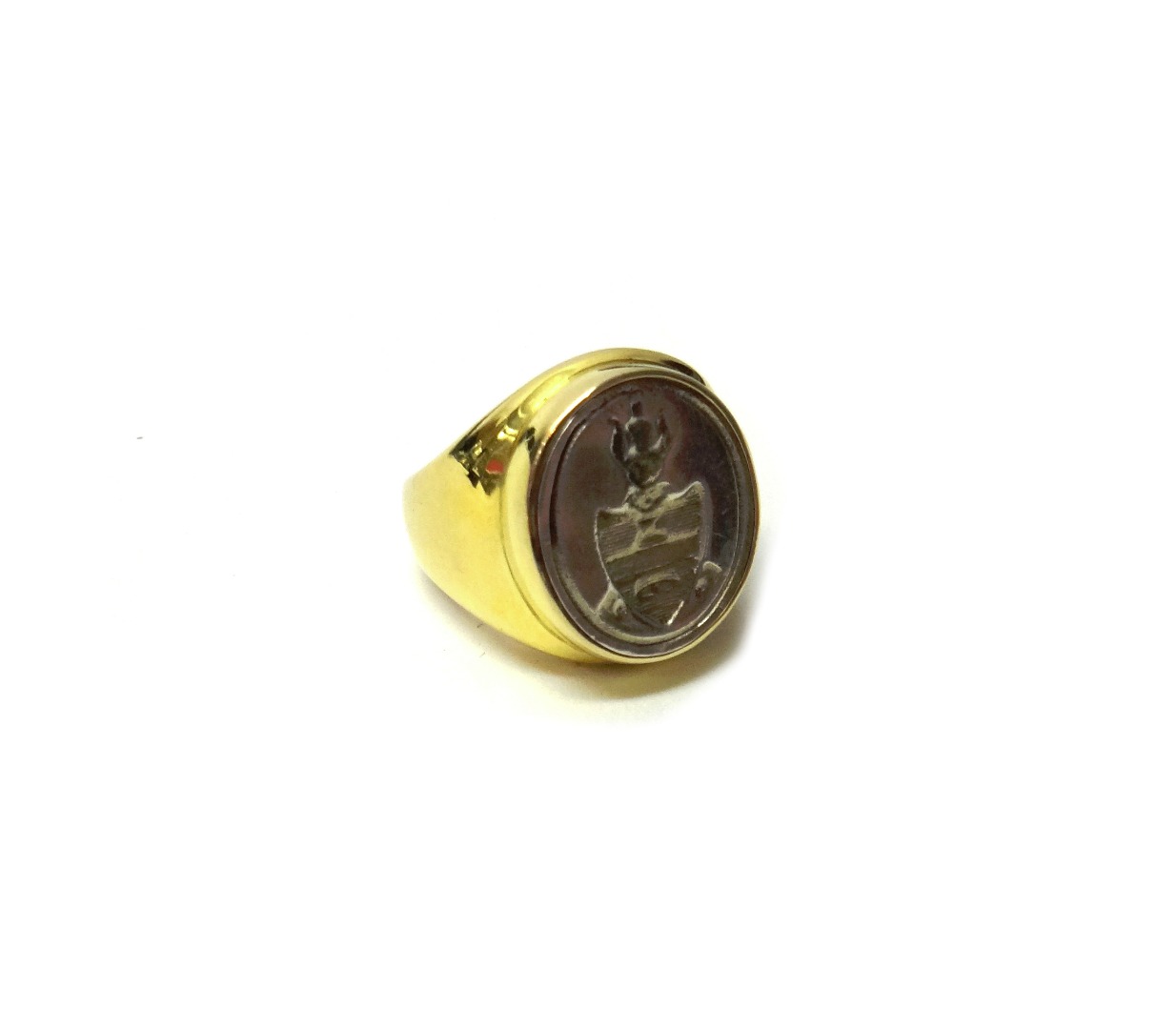 Appraisal: A gold and silver intaglio set signet ring with a