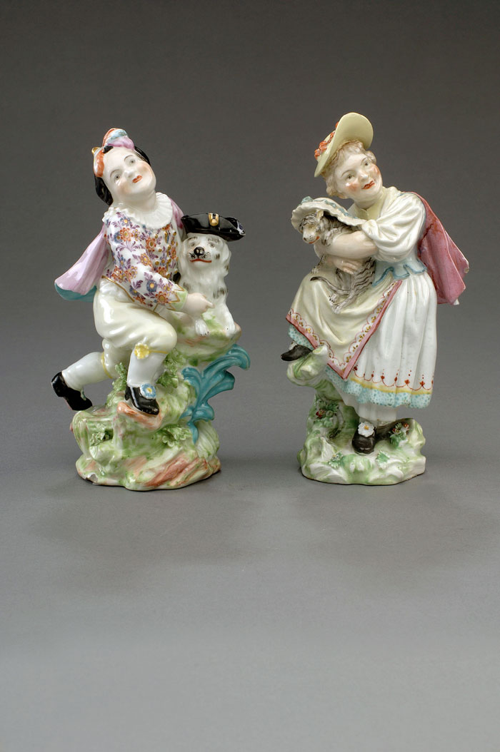 Appraisal: PAIR OF DERBY PORCELAIN FIGURES OF CHILDREN WITH PETS CIRCA