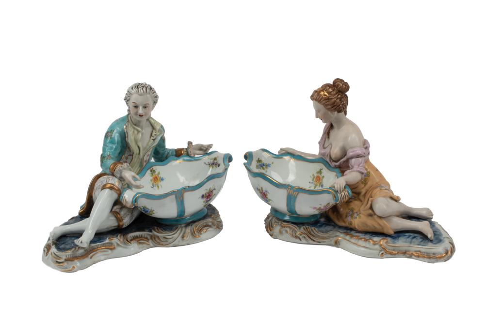 Appraisal: Pair of Meissen-Style Polychrome and Gilt Porcelain Figural Sweetmeat Dishes