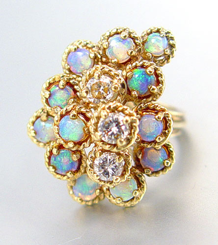 Appraisal: K OPAL DIAMOND RING K yellow gold high profile ring