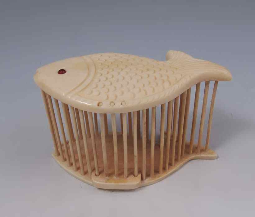 Appraisal: FIGURAL CARP IVORY CRICKET CAGE Carved figural carp top with