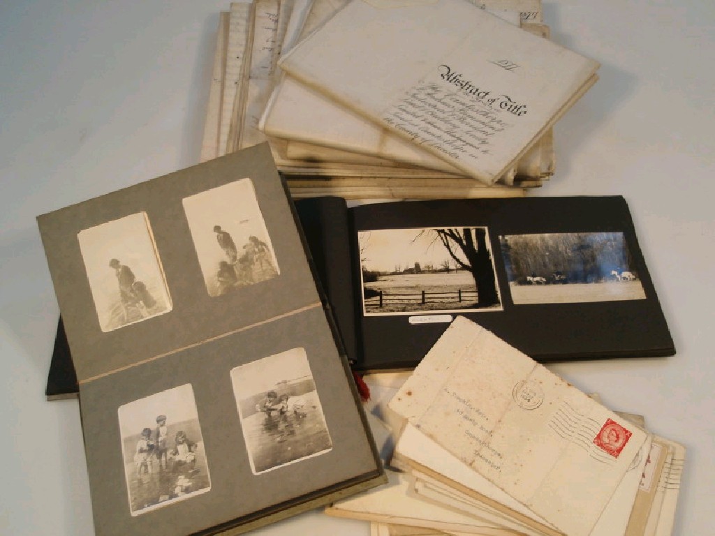 Appraisal: A collection of vintage photographs entires and assorted ephemera