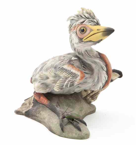 Appraisal: A Boehm Porcelain Figure depicting a blue heron chick raised