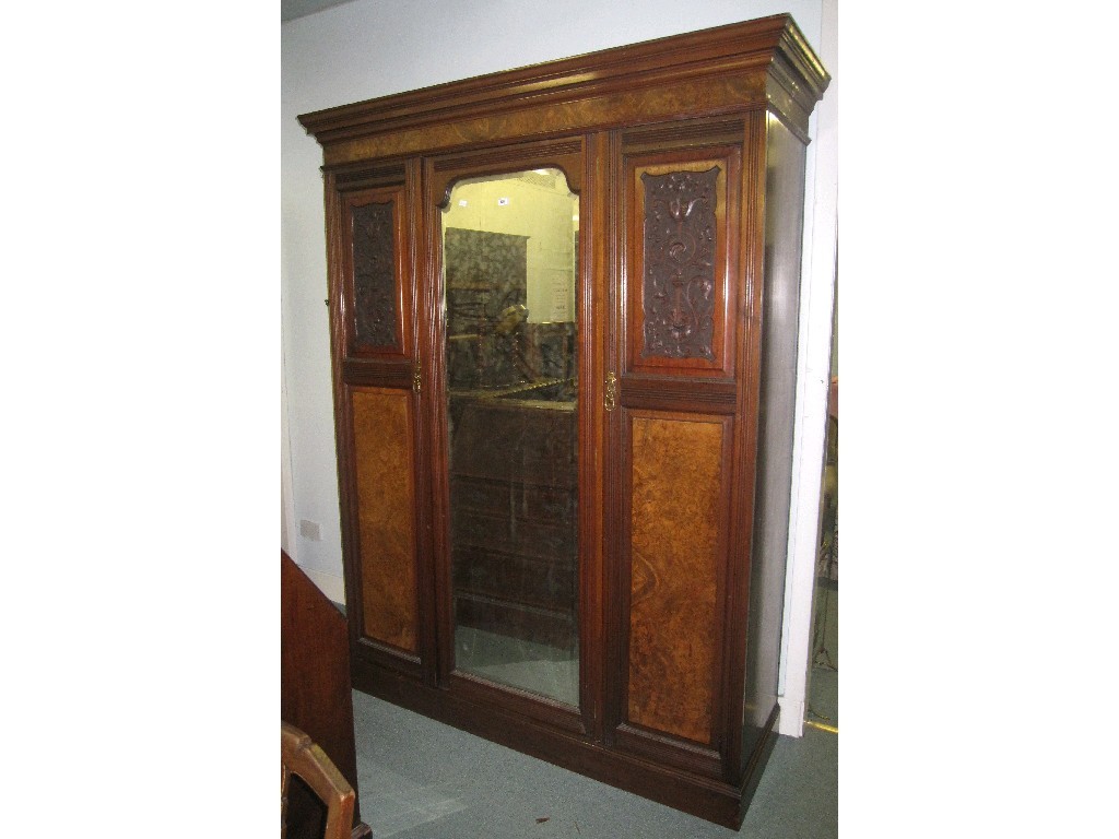 Appraisal: Victorian mahogany three section mirror door wardrobe