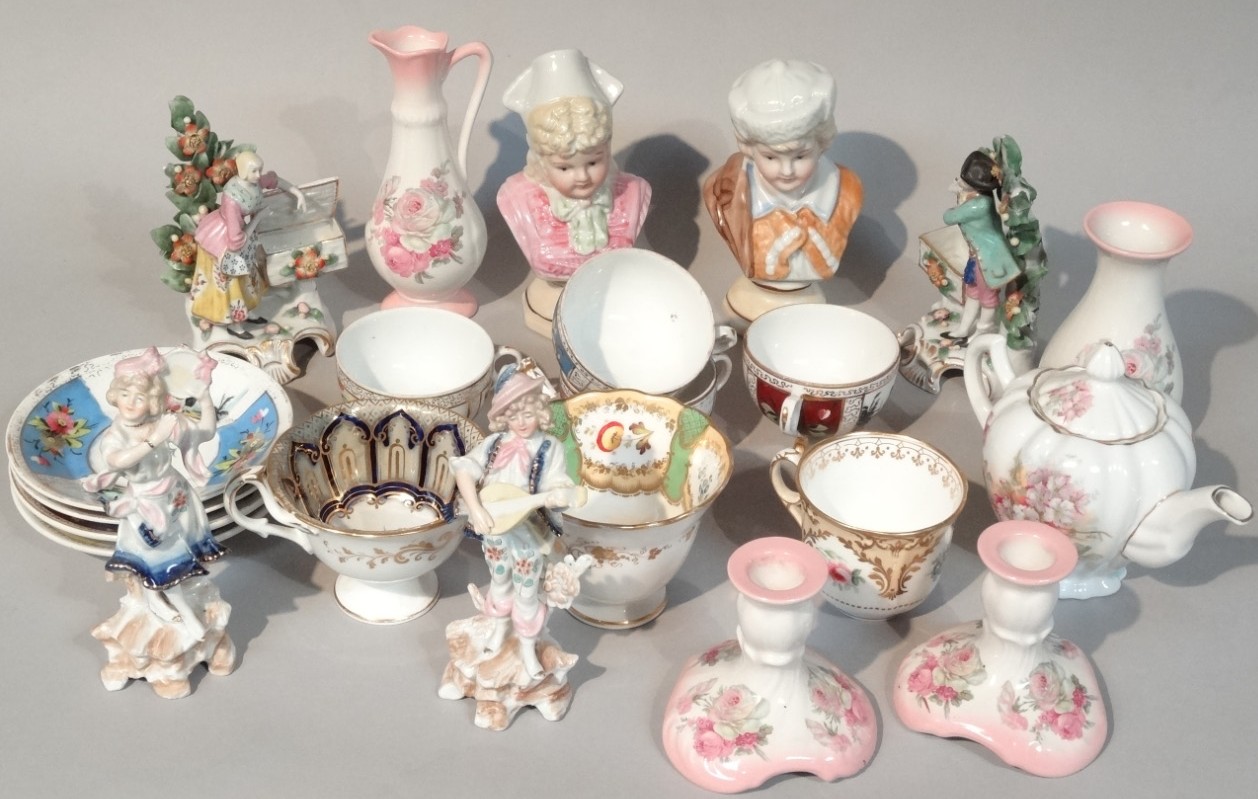 Appraisal: Various Continental porcelain figure groups to include a heavily encrusted