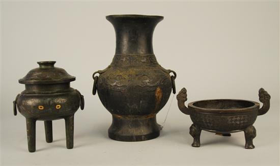 Appraisal: THREE CHINESE ARCHAIC STYLE BRONZE VESSELS two Hu shaped and