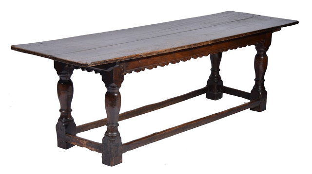 Appraisal: AN ANTIQUE OAK REFECTORY TABLE with plain plank top over