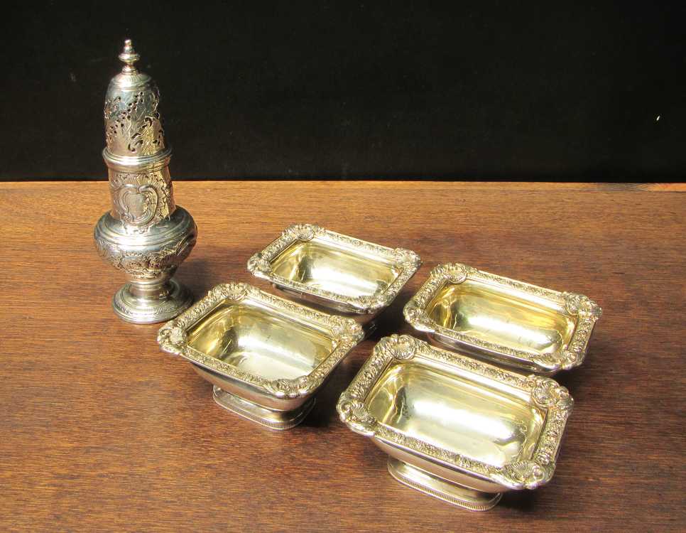 Appraisal: FIVE ENGLISH STERLING SILVER HOLLOWWARE PIECES footed muffineer hallmarked London