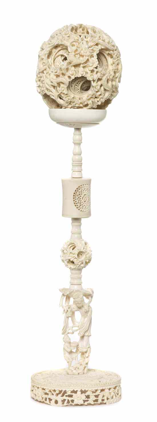 Appraisal: A Large Chinese Ivory Puzzle Ball and Stand the sphere