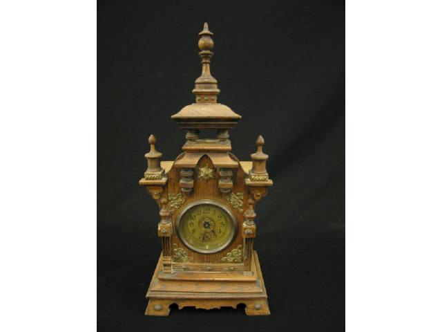 Appraisal: Victorian Oak Musical Clock ornate brass trim tall working