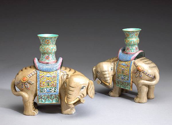 Appraisal: A pair of polychrome enameled porcelain elephant-form vases Qianlong Marks