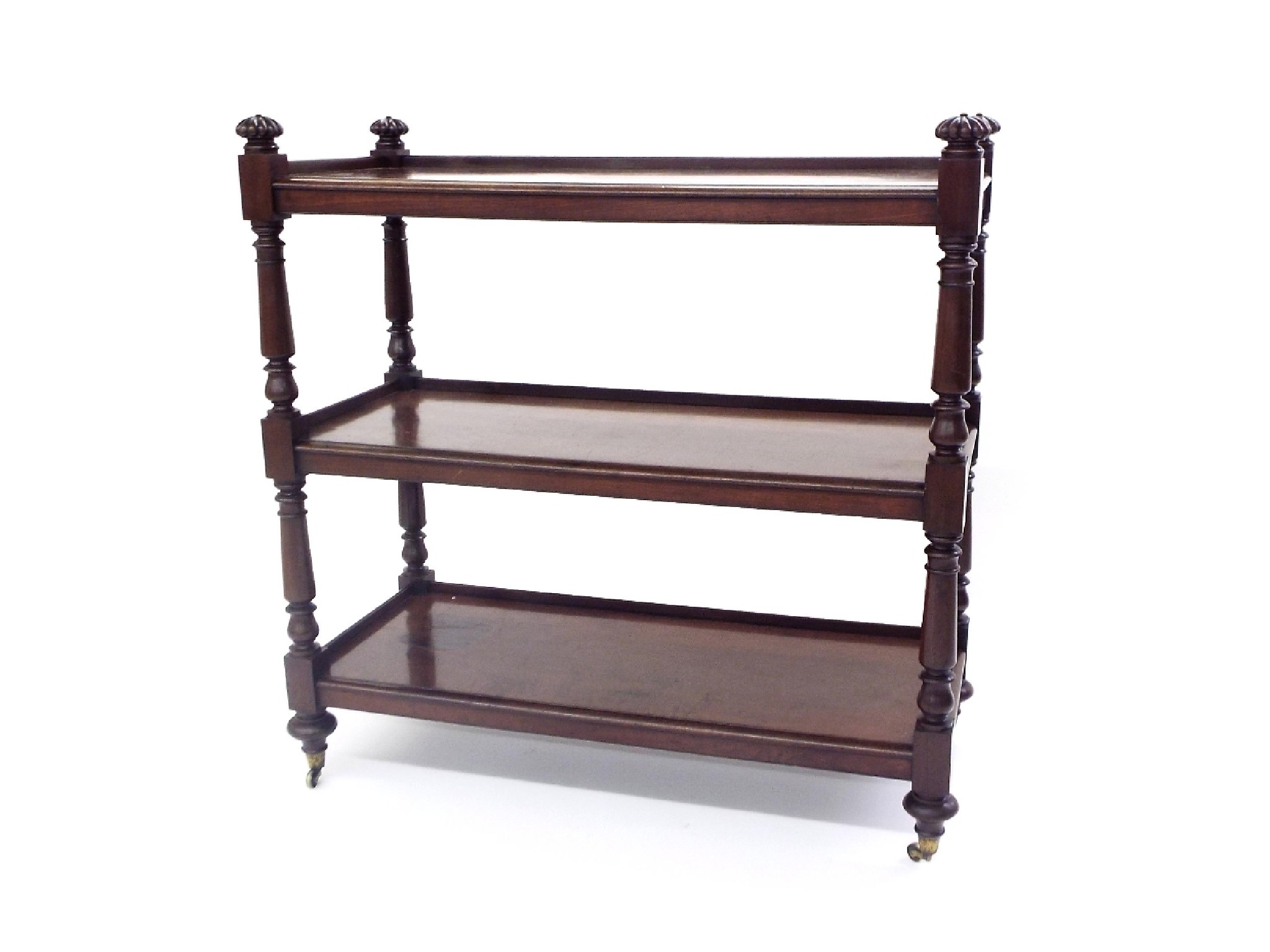 Appraisal: th century mahogany three tier buffet with gadrooned finials and